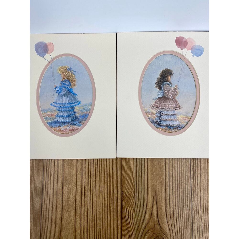 Two Sue Ratliff Matted Prints Young Girl Balloons Pastel Colors 8" x 10"